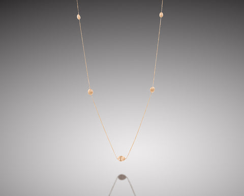 Anemone long necklace in rose gold with seven diamond nuggets