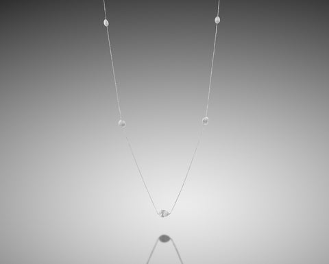 Anemone long necklace in white gold with seven diamond nuggets