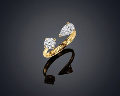 Aria open ring in yellow gold with round and pear shaped diamonds