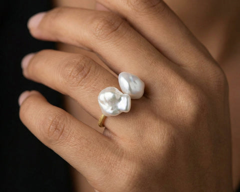 Backbone Keshi pearl ring worn on the hand