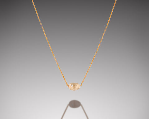 Bryozoa necklace in rose gold with a single diamond nugget