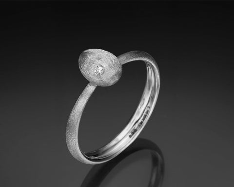 Small Cleaner Wrasse ring in white gold with a bezel set diamond