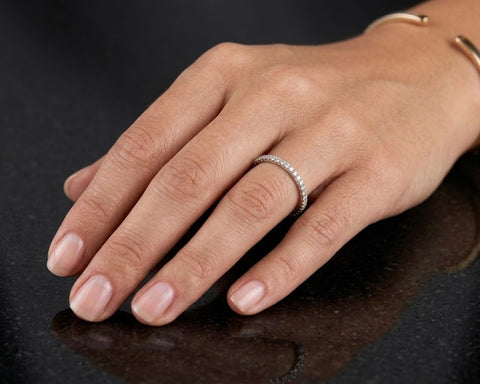 Ella diamond eternity band worn on the hand
