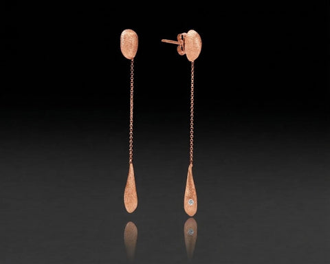 Flameback drop earrings in rose gold with a diamond in each flame drop