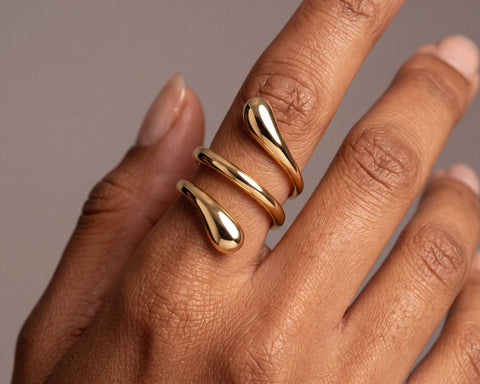 Spiral ring worn on the hand, covering two joints of the finger