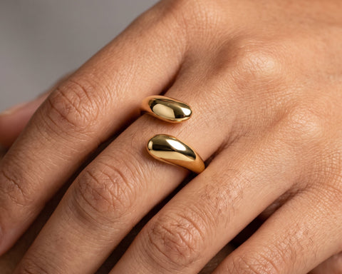Viper open twist ring worn on the hand