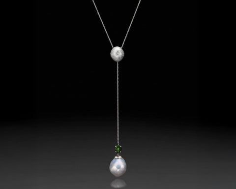 Green Flame lariat necklace in white gold with green tourmaline and keshi pearl