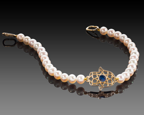 The bracelet laid open showing the clasp with no moving parts