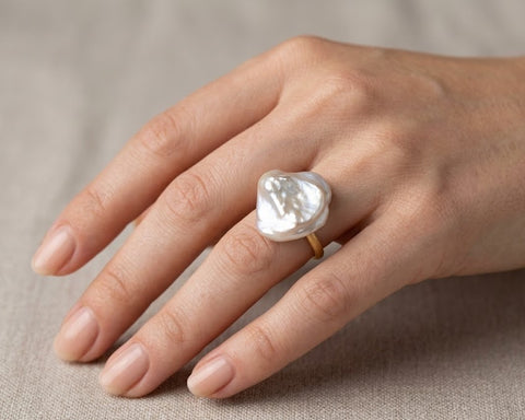 Juno Keshi baroque pearl ring worn on the hand