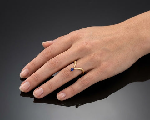 King Of Blue V shape sapphire ring worn on the hand