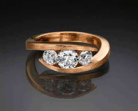 Liliane three-stone wrapped diamond ring in rose gold