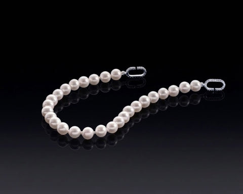 Lustrous Harmony bracelet shown open, with the diamond clasp undone