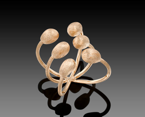 Narwhal ring in rose gold with six brushed nuggets