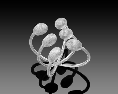 Narwhal ring in white gold with six brushed nuggets