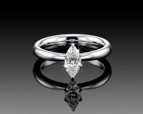 Nelli marquise solitaire engagement ring in polished white gold
