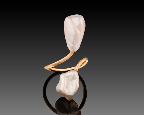 Ocean Bloom open twist ring in rose gold with two freshwater keshi pearls, one at each end