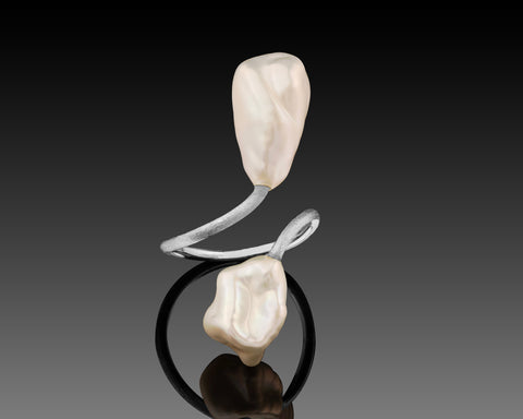 Ocean Bloom open twist ring in white gold with two freshwater keshi pearls, one at each end