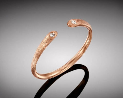 Ostracod open ring in rose gold with a diamond at each end