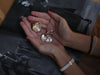Video of the Orchid ring held in the hands, showing the two petal pearls from several angles