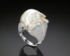 Video of the 18K white gold Keshi pearl ring turning to show the pavé diamonds and the pearl's lustre