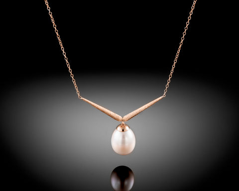 Handmade 18K rose gold V shaped necklace with a white freshwater oval pearl