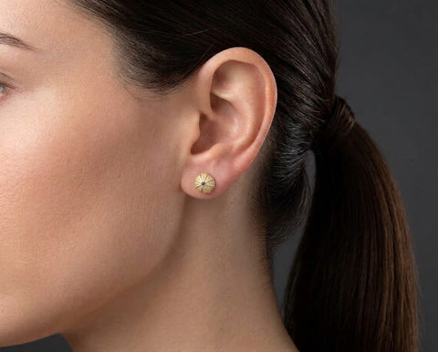 Sea Urchin stud earring, 9 mm, worn on the ear