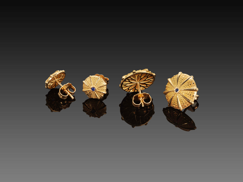 Sea Urchin stud earrings in 9 mm and 13 mm, yellow gold, showing the sapphire fronts and the hand-pierced backs side by side