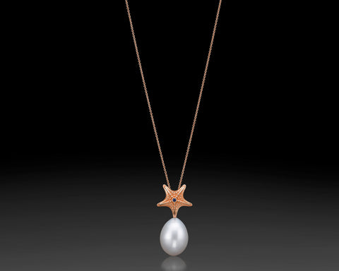 Starfish pendant in rose gold with a white drop pearl