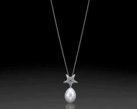 Starfish pendant in white gold with a white drop pearl
