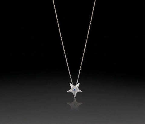 Starfish pendant in white gold with granulated texture