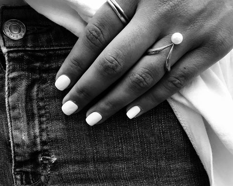 Sunshine V shape pearl ring worn on the hand