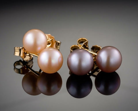 Supernova stud earrings in yellow gold with pink and purple freshwater pearls