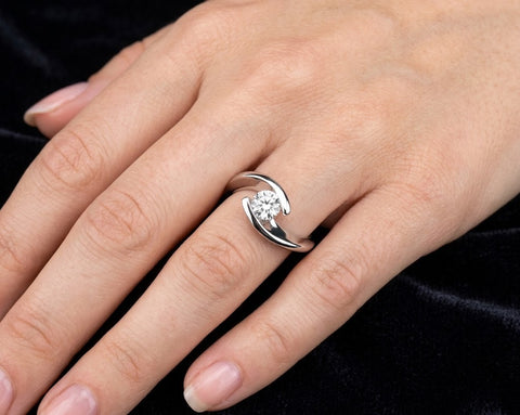 Suspended Light diamond ring worn on the hand