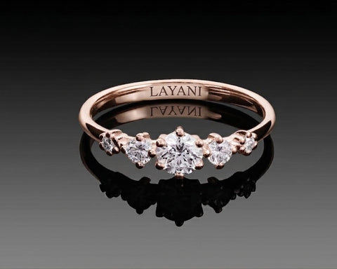 Front view of the Tavor ring showing the diamonds stepping down from the center