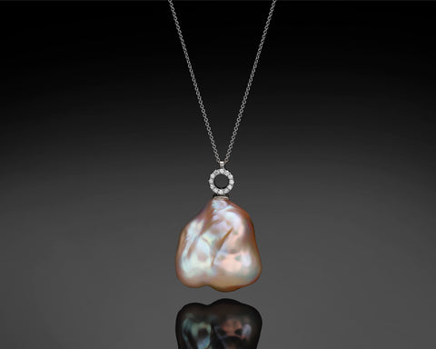 Handmade 18K white gold necklace with a large Keshi baroque pearl and a diamond set circle