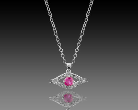 White gold guardian eye pendant with a ruby center stone