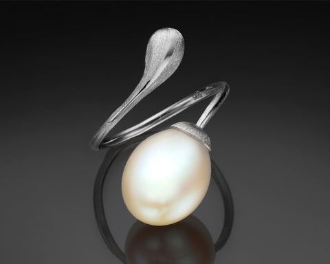 Handmade white gold twist ring with a white freshwater drop pearl
