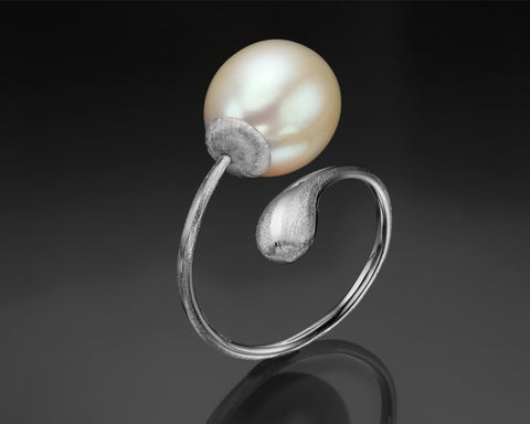 Second angle of a white gold twist ring with a white drop pearl