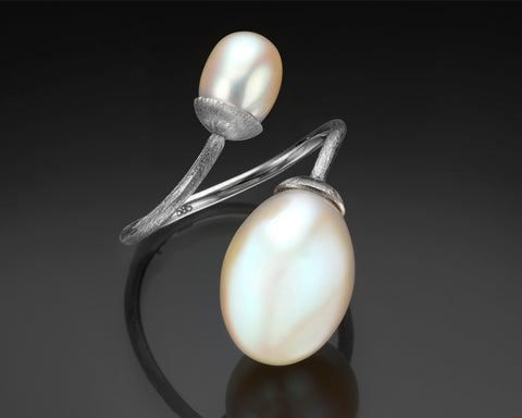 Handmade white gold open ring with two white freshwater drop pearls of different sizes