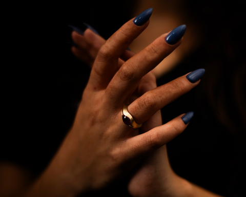 Hellenistic revival ruby ring worn on the hand