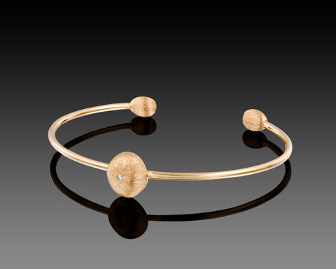 Yellowfin open bangle in rose gold with three brushed diamond nuggets
