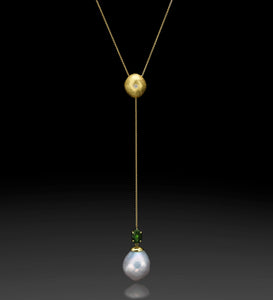 "Green Flame"- Yellow gold lariat pendant set with Tourmaline.