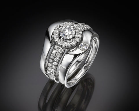 Eimy french-set halo engagement ring with two matching diamond bands in 18K white gold
