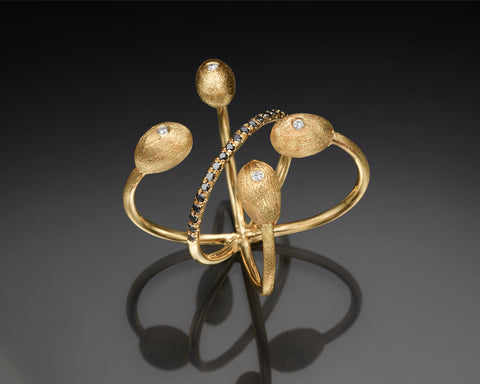 Fugu ring in 14K yellow gold with four hollow gold forms and black diamond micro pave