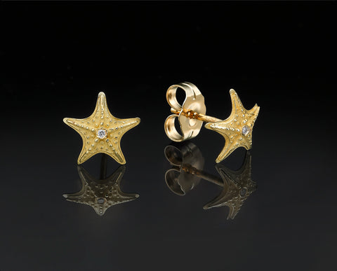 Starfish stud earrings in 14K yellow gold, granulated domed starfish forms each with a diamond at the center