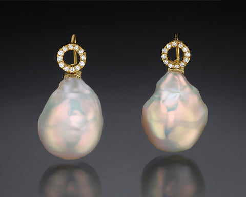 Handmade 14K yellow gold hook earrings with white Keshi pearls and a diamond set circle