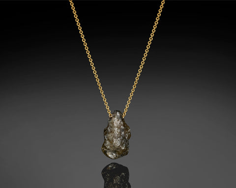 Gravity pendant, 4.20 carat raw green diamond threaded on a 14K yellow gold rolo chain, by LAYANI Fine Jewelry Jerusalem