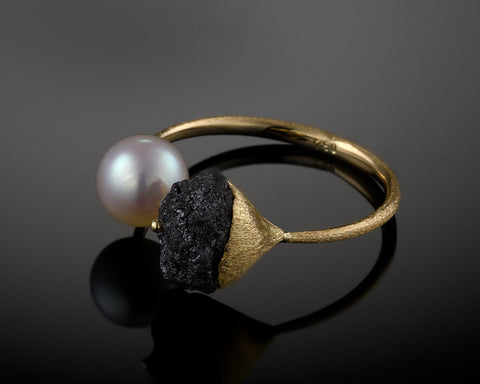 Namaka ring, 2.30 carat raw black diamond facing a freshwater pearl on an open 18K yellow gold band, by LAYANI Fine Jewelry Jerusalem